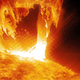 Imagen para el artículo titulado Cuando encuentres la Tierra en esta imagen de una erupción solar te sentirás muy pequeño